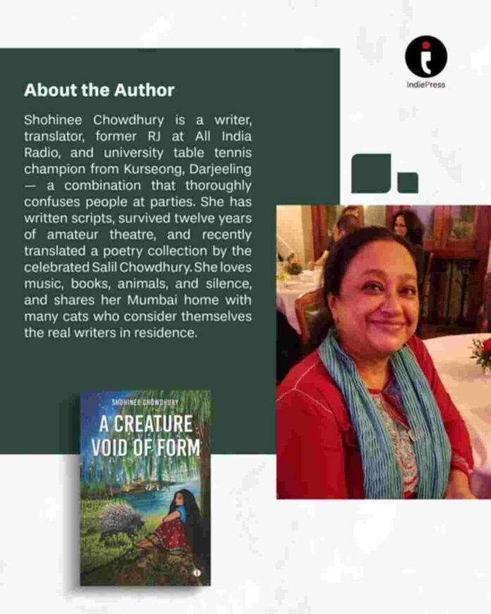 Author Shohinee Chowdhury holding her poetry book A Creature Void of Form